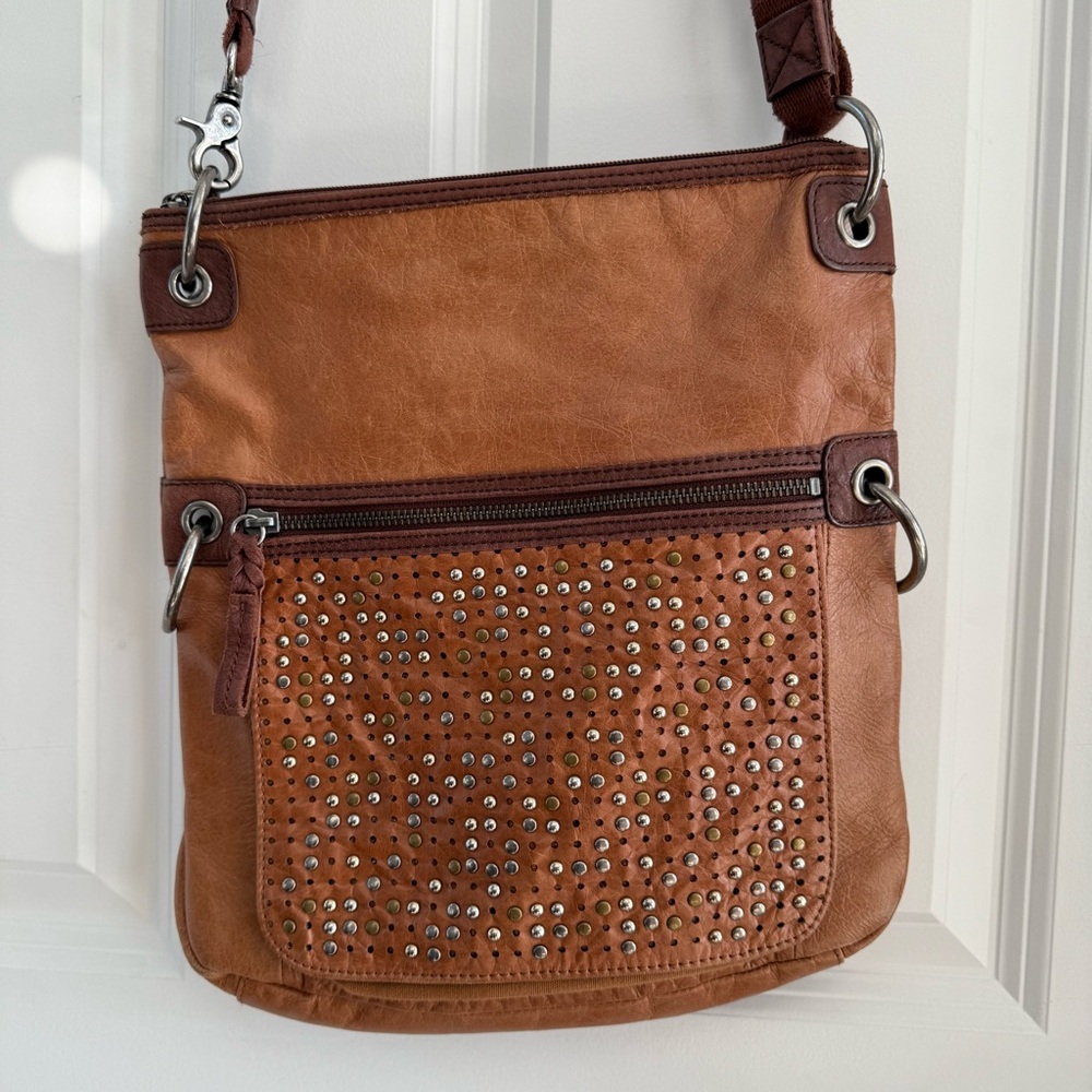The Sak leather crossbody bag riveted gold silver